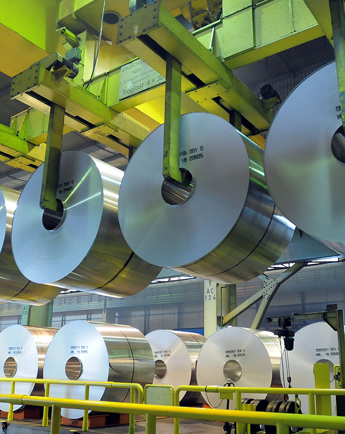 Rolls of aluminum ready to be shaped into cans