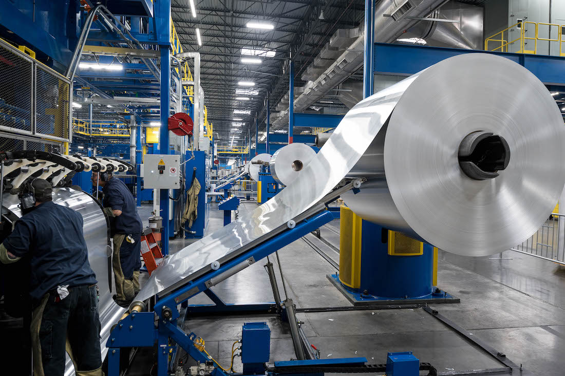 Rolls of aluminum ready to be shaped into cans