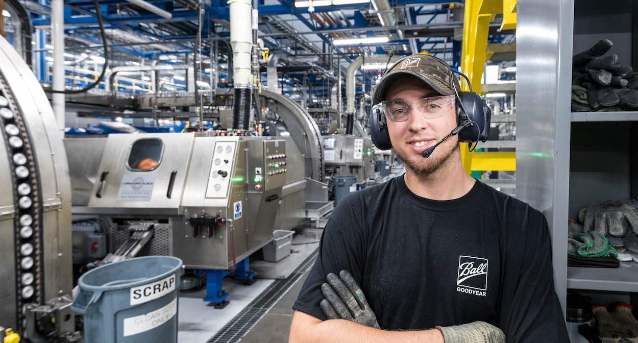 Smiling factory worker